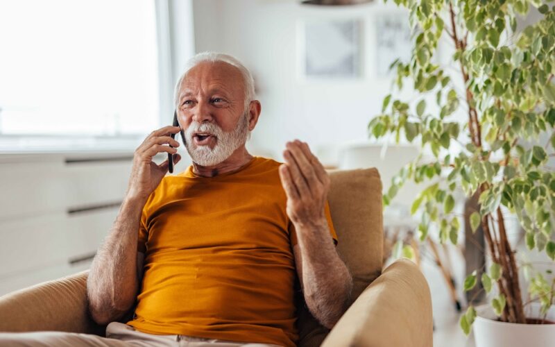 Senior businessman, trying to help his coworker, from home office.